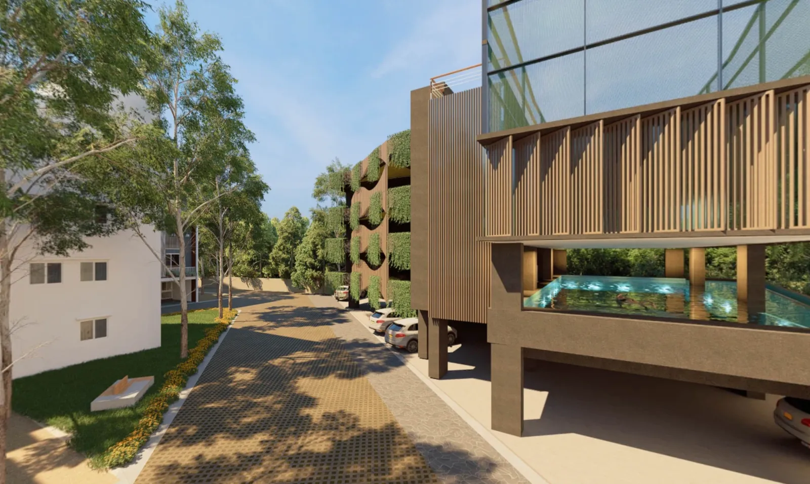 The club house with an elevated swimming pool set into a wood-screened block